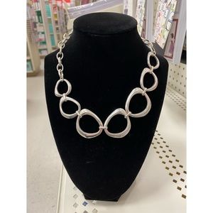 Nickel plated necklace, geometric circles, standard clasp closure. Eye-catching!